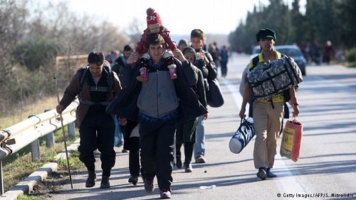 اتهامات لميركل بابتزاز