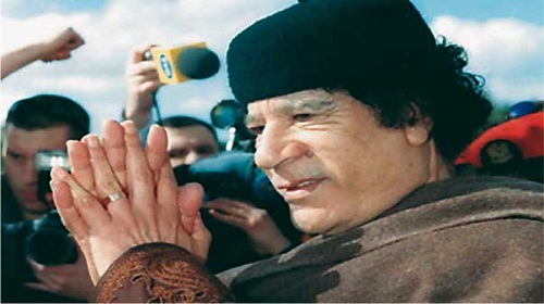  معمر القذافي 