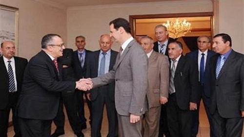 علاقته بالأسد: