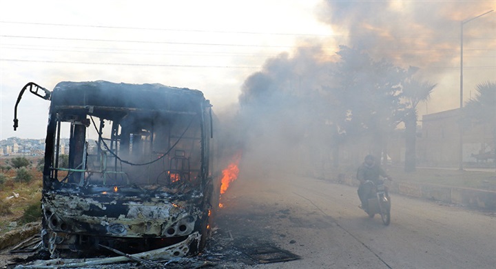 المسلحون يحرقون حافلات
