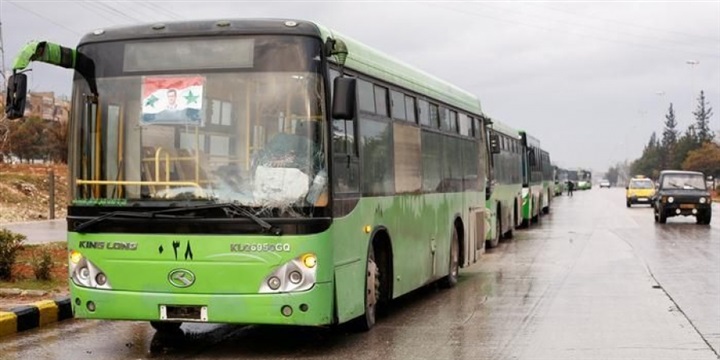 اتوبيسات تقل المعارضين