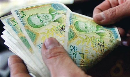 تراجع العملة السورية