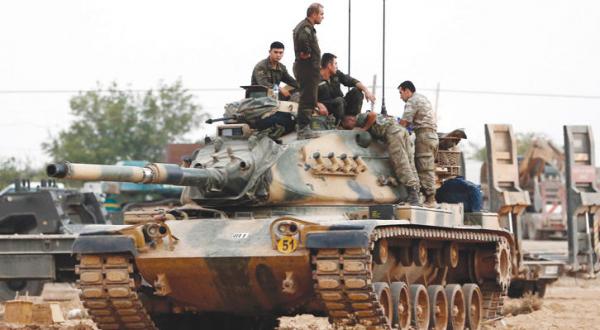 الرقة بين رحى داعش