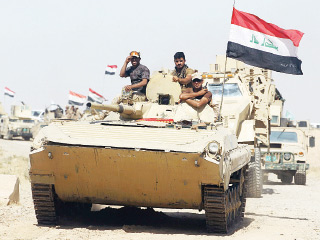 «داعش» يحرق آبار